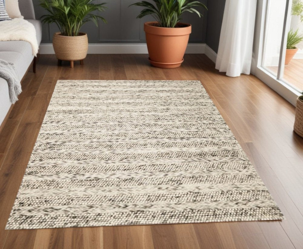 7' X 9' Gray And Ivory Wool Striped Hand Woven Area Rug