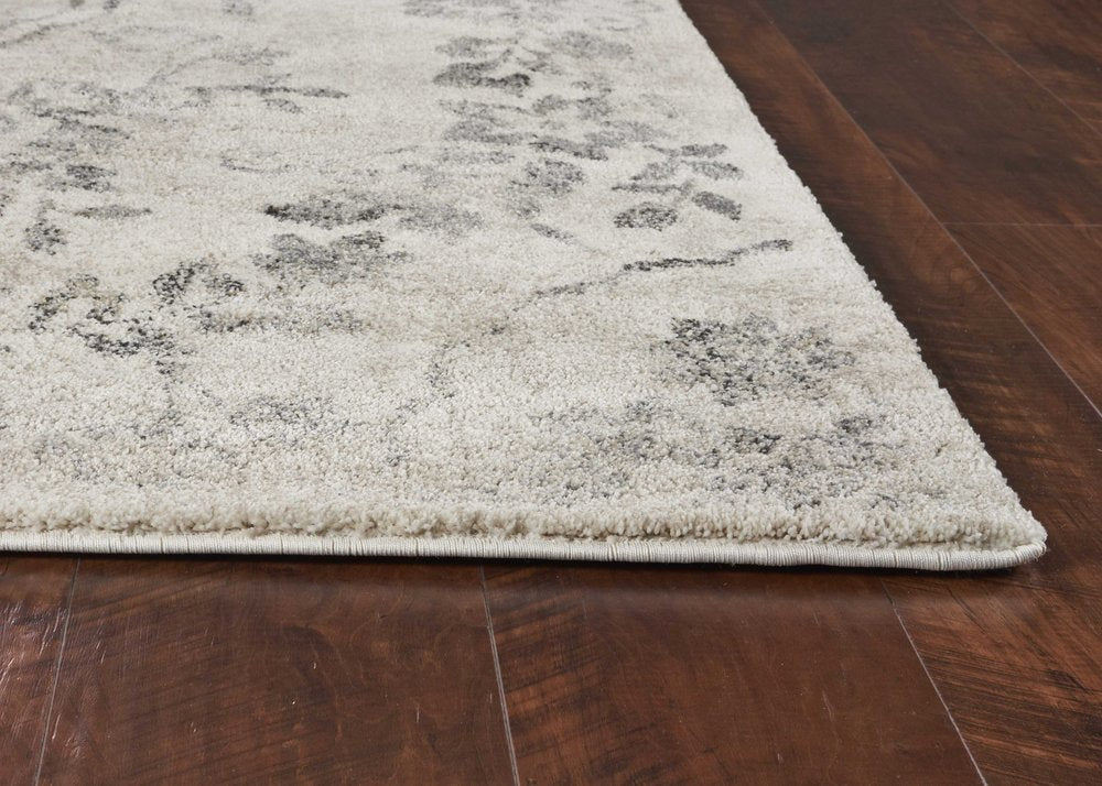 5' X 8' Gray And Tan Floral Distressed Area Rug