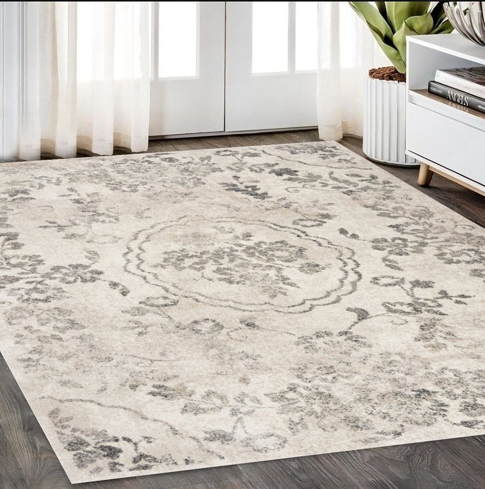 5' X 8' Gray And Tan Floral Distressed Area Rug