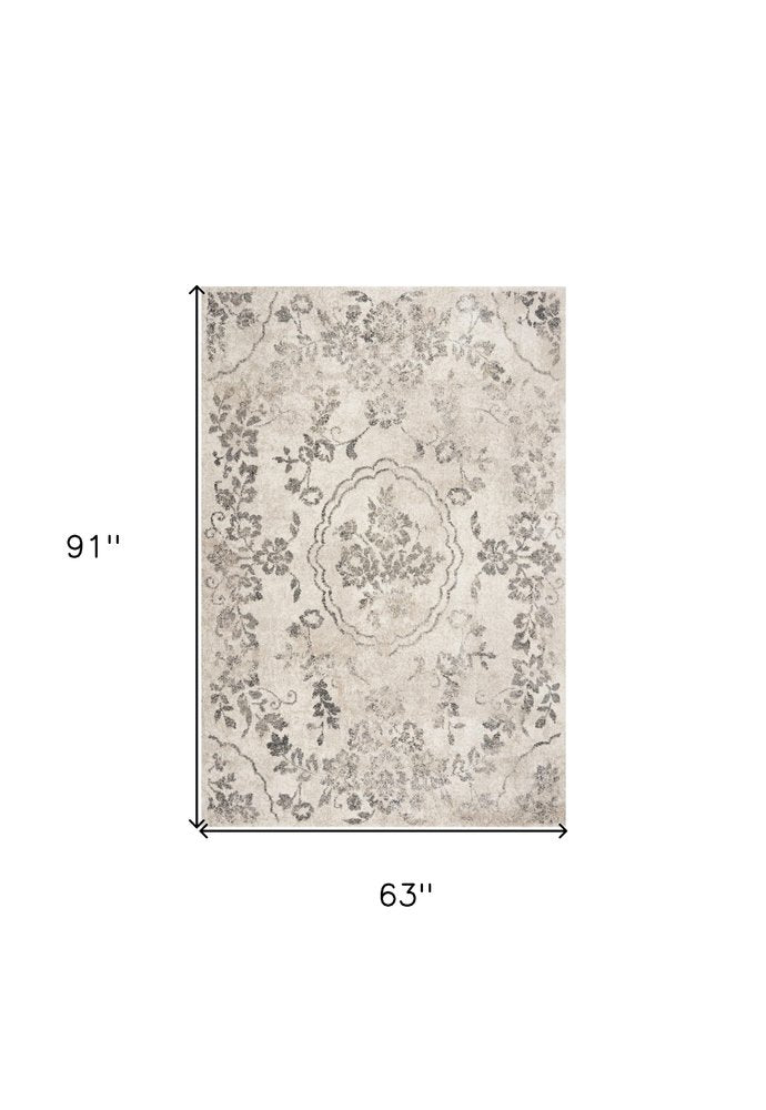 5' X 8' Gray And Tan Floral Distressed Area Rug