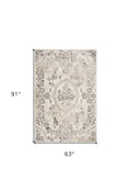 5' X 8' Gray And Tan Floral Distressed Area Rug