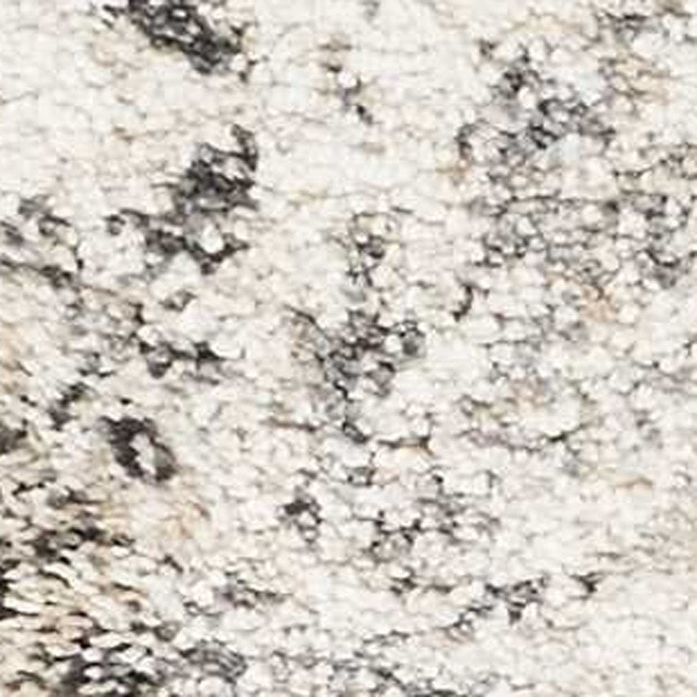 5' X 8' Gray And Tan Floral Distressed Area Rug