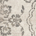 5' X 8' Gray And Tan Floral Distressed Area Rug
