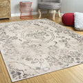 5' X 8' Gray And Tan Floral Distressed Area Rug