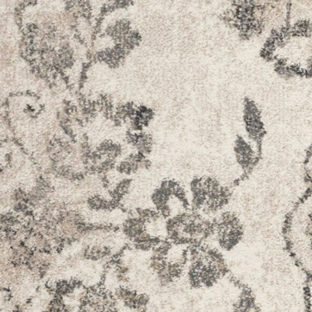 5' X 8' Gray And Tan Floral Distressed Area Rug