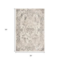 5' X 8' Gray And Tan Floral Distressed Area Rug