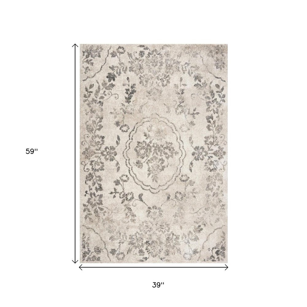 5' X 8' Gray And Tan Floral Distressed Area Rug