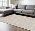 5' X 8' Beige and Ivory Geometric Area Rug