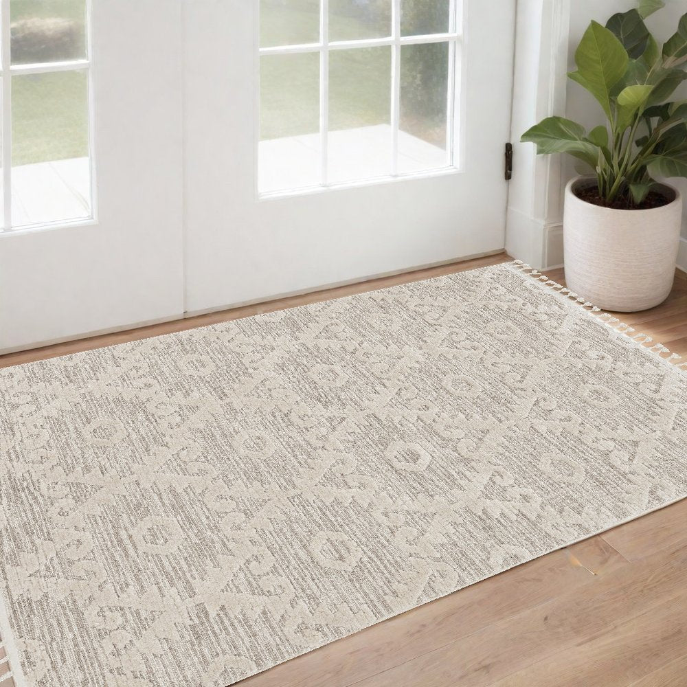 5' X 8' Beige and Ivory Geometric Area Rug