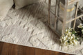 5' X 8' Beige and Ivory Geometric Area Rug