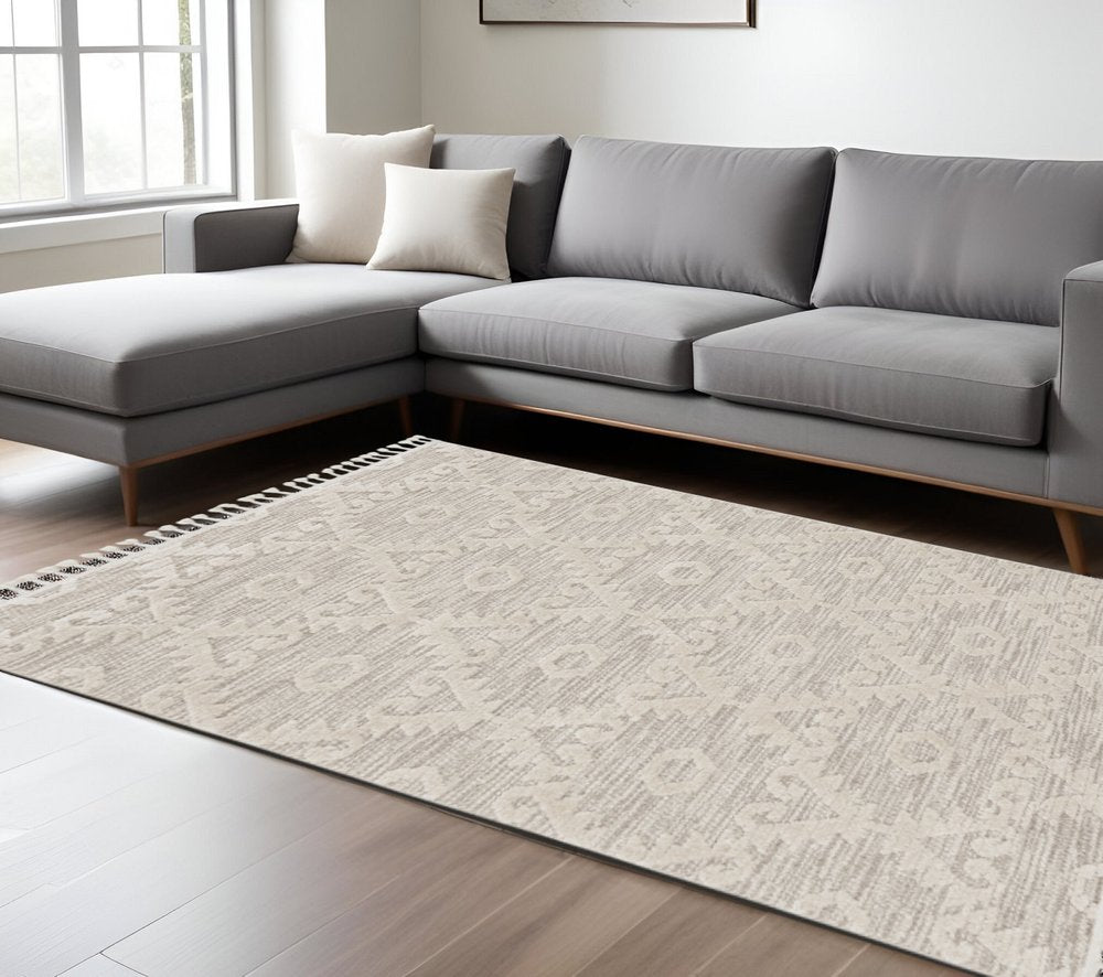 5' X 8' Beige and Ivory Geometric Area Rug