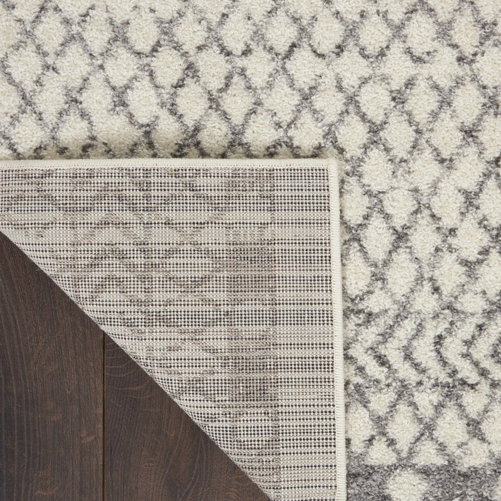 5' X 7' Gray And Ivory Geometric Distressed Area Rug