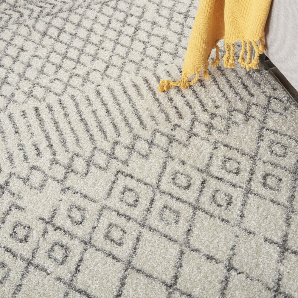 5' X 7' Gray And Ivory Geometric Distressed Area Rug