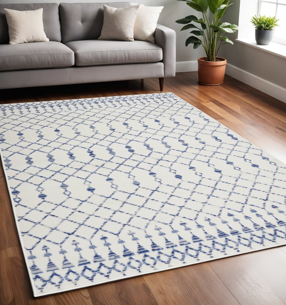 6' X 9' Ivory And Blue Geometric Area Rug