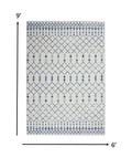 6' X 9' Ivory And Blue Geometric Area Rug