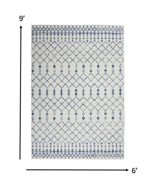 6' X 9' Ivory And Blue Geometric Area Rug
