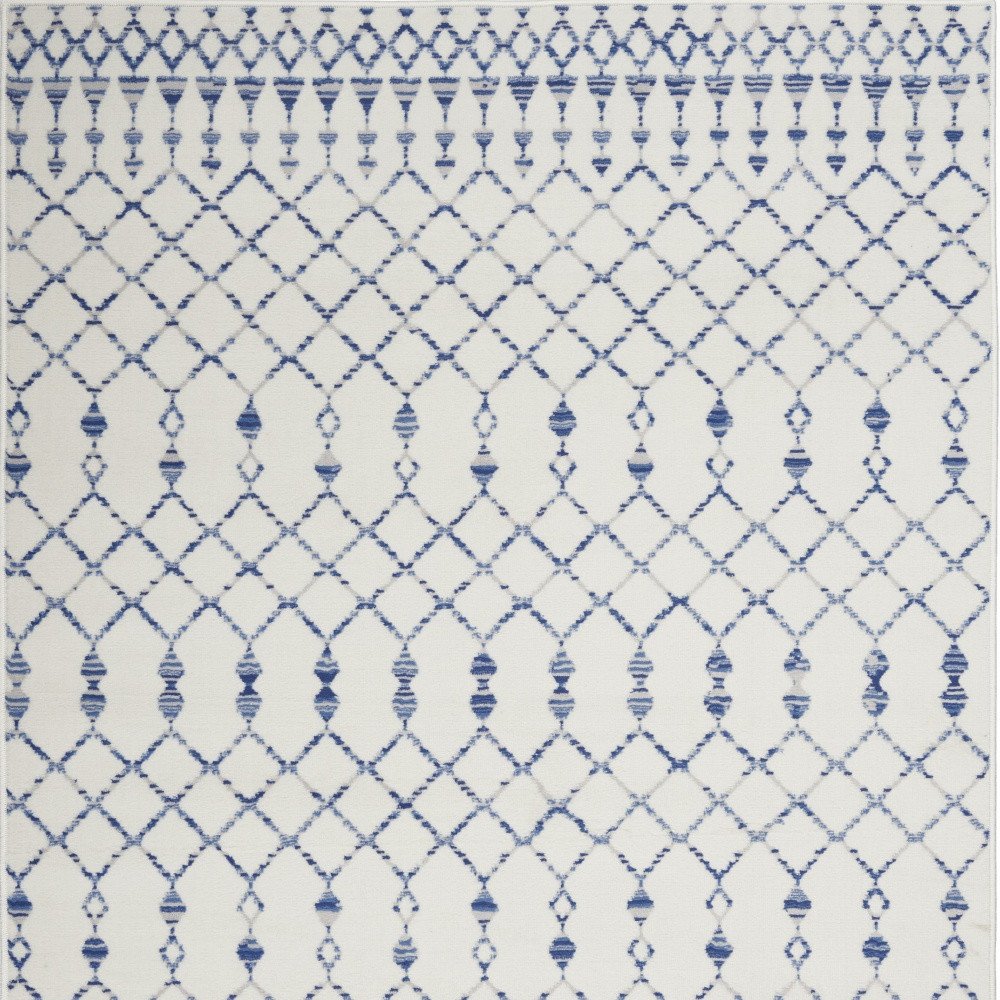 6' X 9' Ivory And Blue Geometric Area Rug
