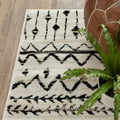 8' Ivory And Black Tribal Runner Rug