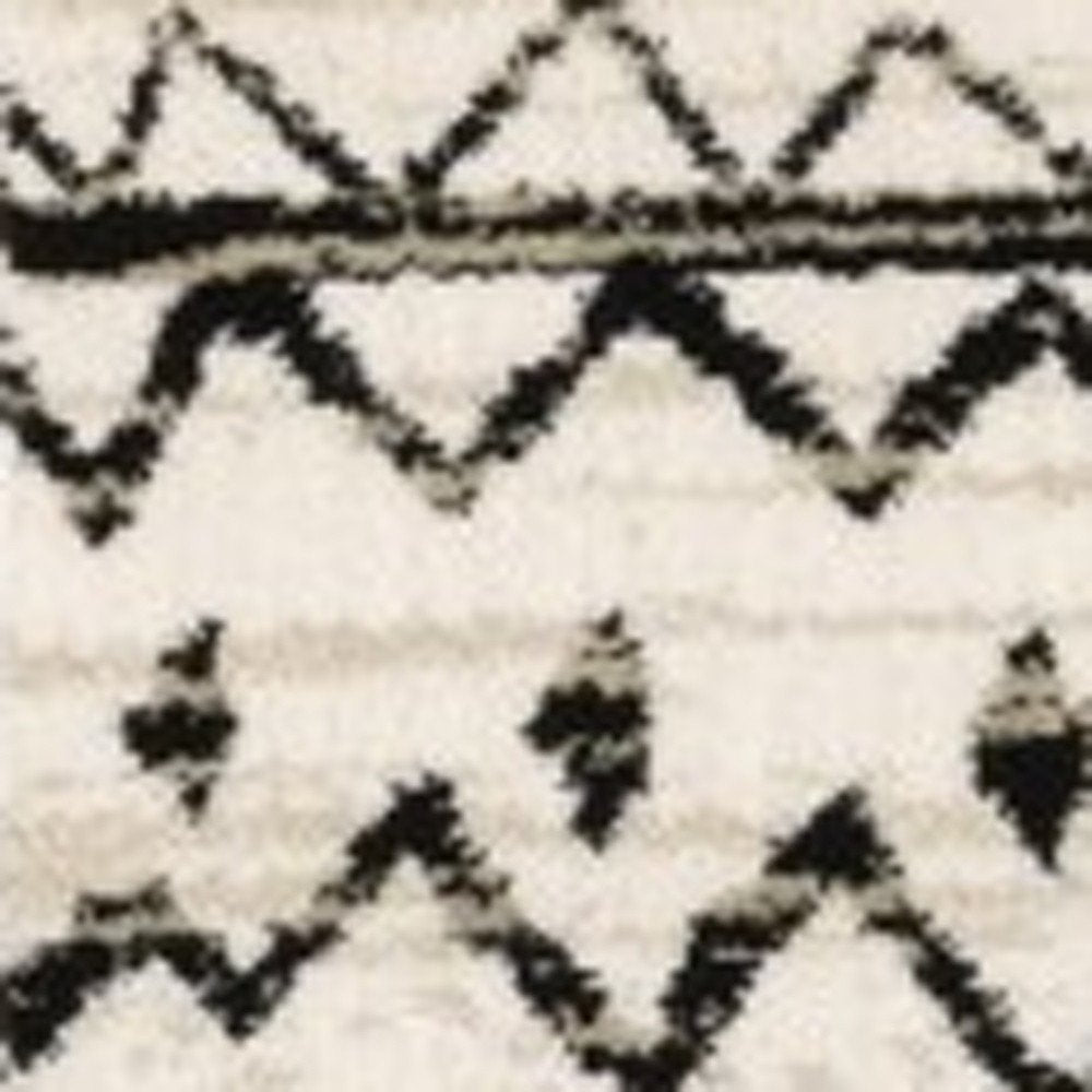 5' X 7' Ivory And Black Abstract Geometric Distressed Area Rug