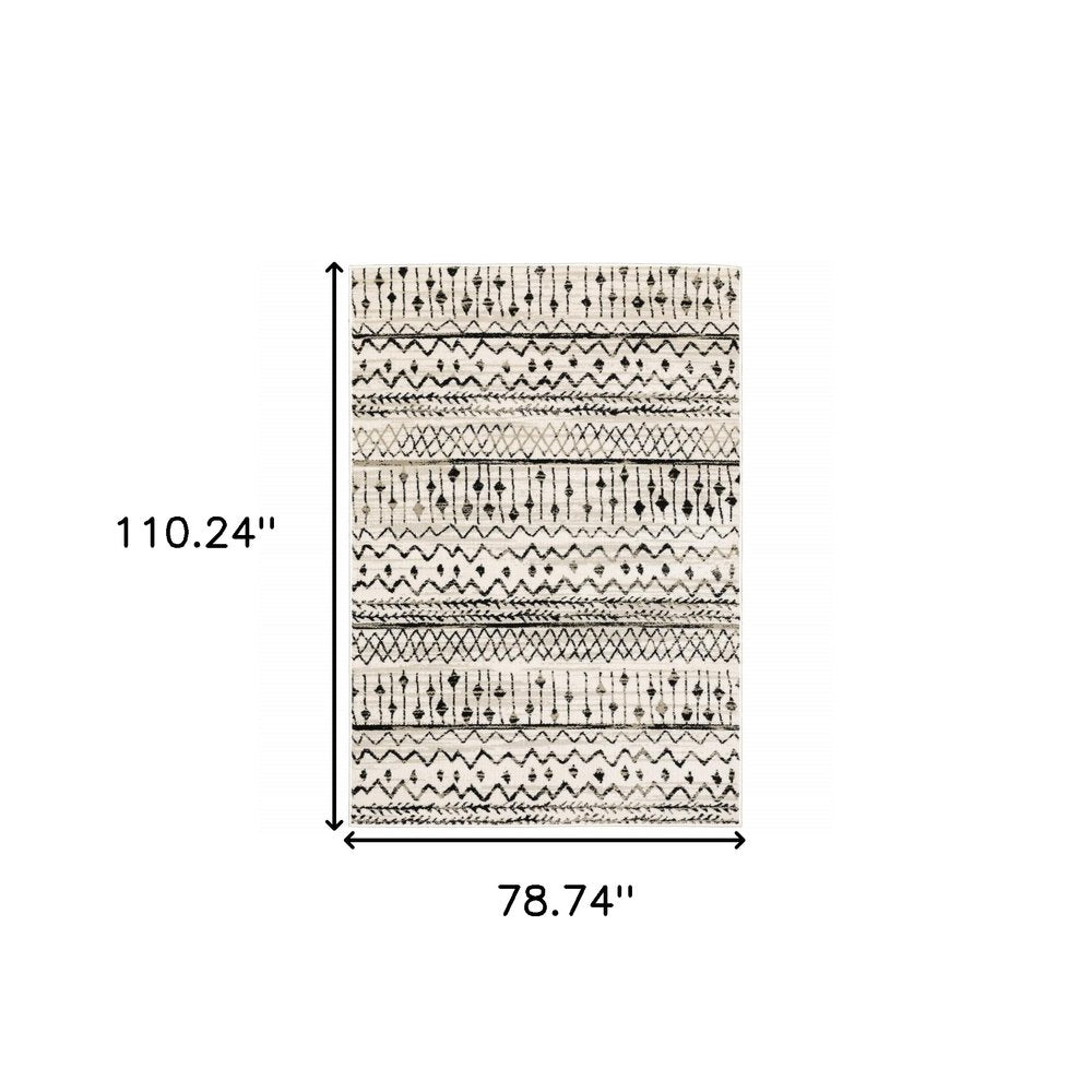5' X 7' Ivory And Black Abstract Geometric Distressed Area Rug