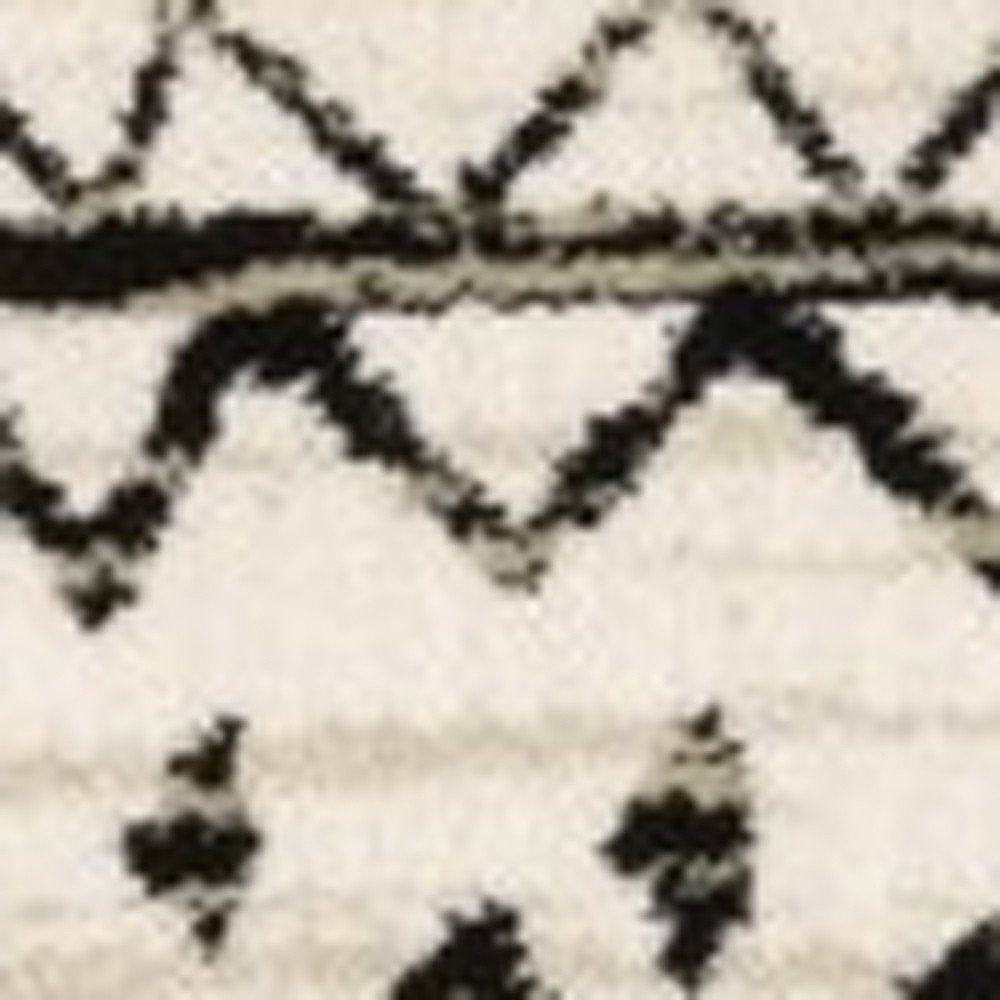 5' X 7' Ivory And Black Abstract Geometric Distressed Area Rug