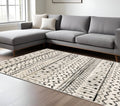 5' X 7' Ivory And Black Abstract Geometric Distressed Area Rug