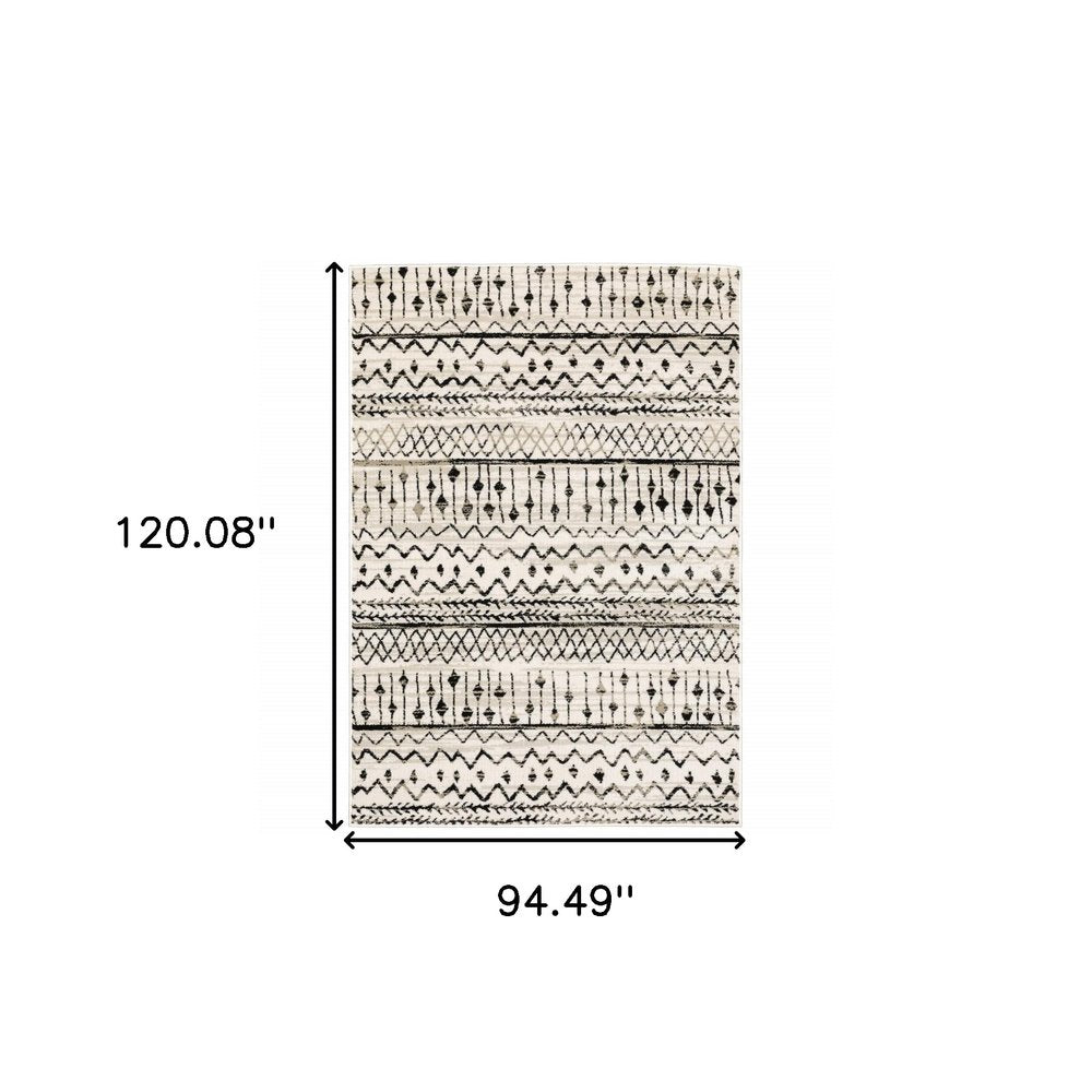 5' X 7' Ivory And Black Abstract Geometric Distressed Area Rug