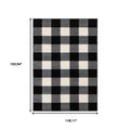 7' X 9' Black And Ivory Gingham Area Rug