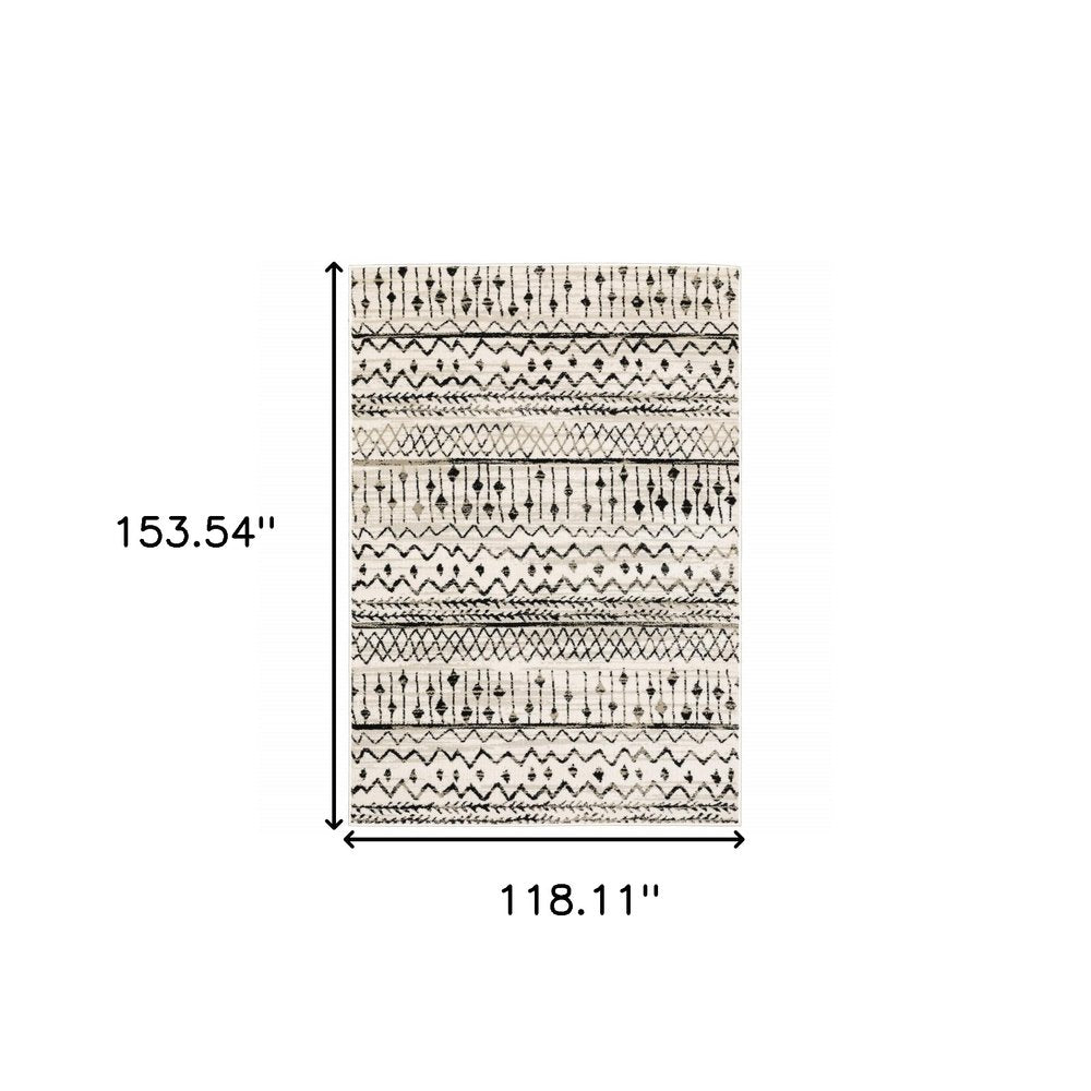 5' X 7' Ivory And Black Abstract Geometric Distressed Area Rug