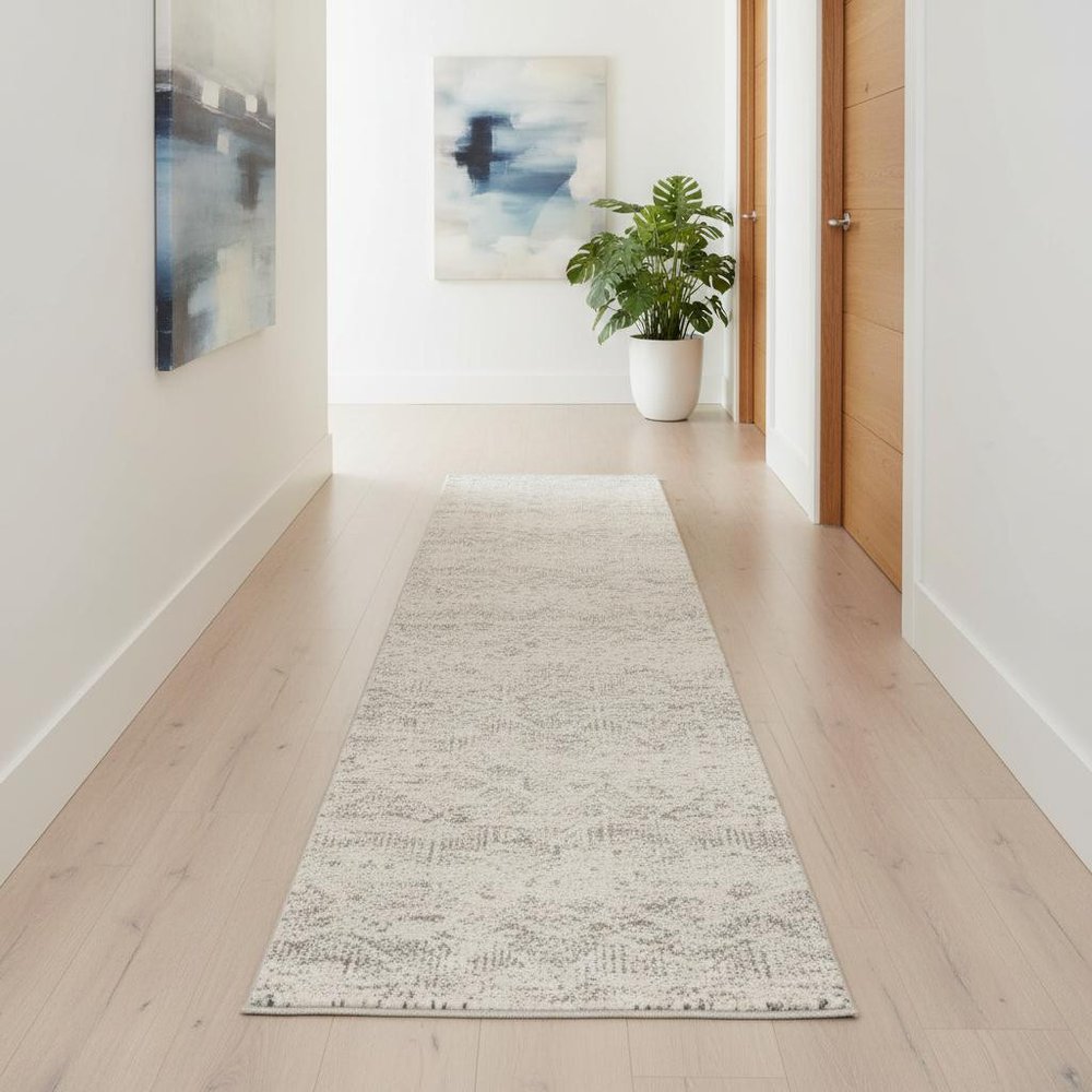5' X 8' Ivory Distressed Ikat Pattern Area Rug