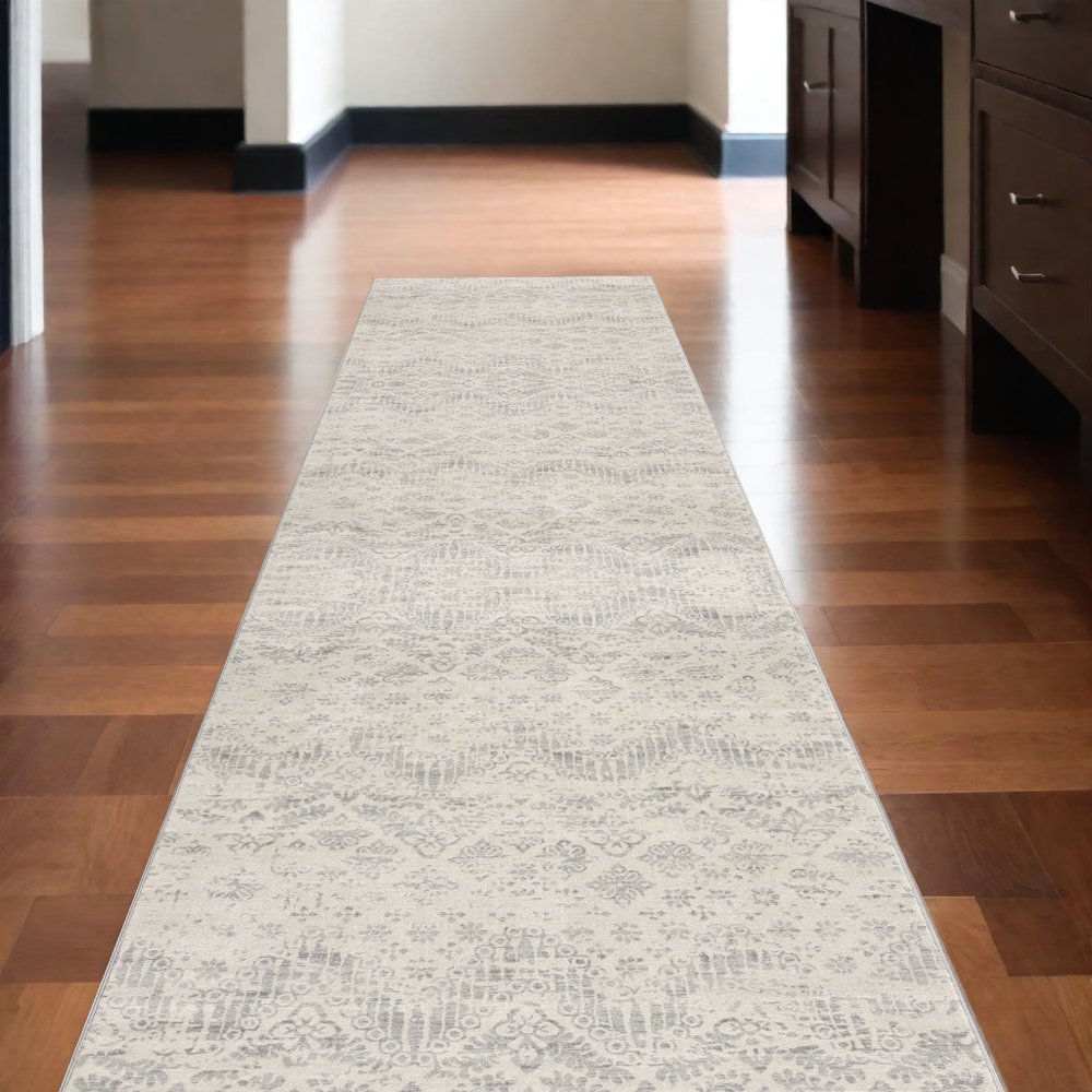 5' X 8' Ivory Distressed Ikat Pattern Area Rug