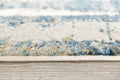 5' X 7' Blue and Ivory Abstract Area Rug