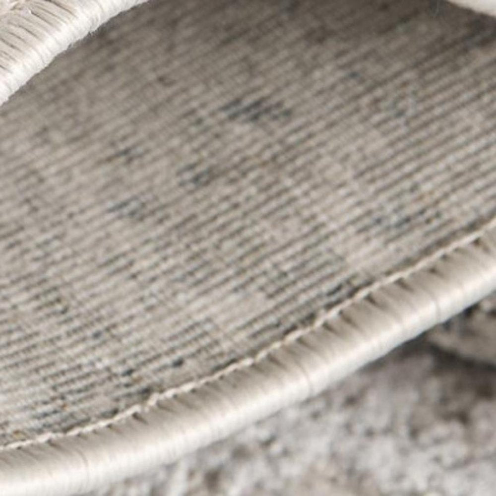 5' X 7' Gray and Ivory Abstract Area Rug