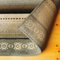 5' X 8' Gray Brown And Ivory Geometric Area Rug