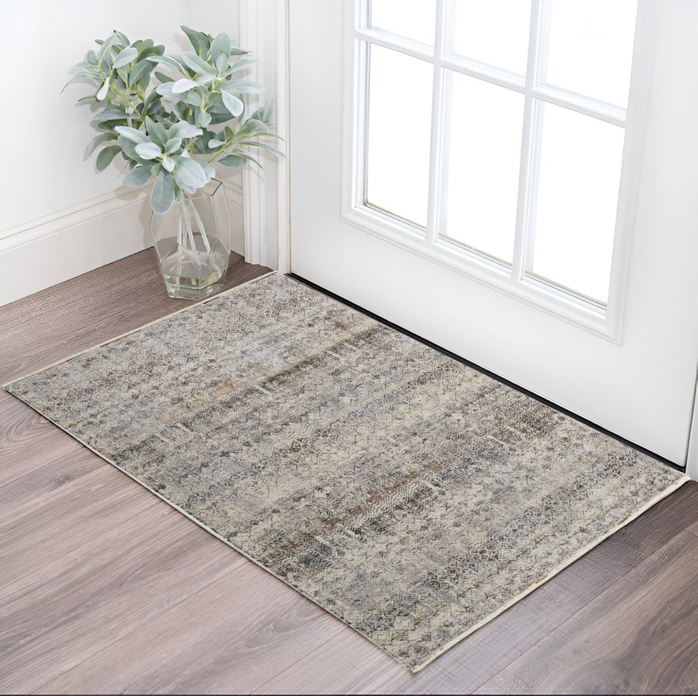 8' Gray Ivory and Blue Abstract Power Loom Worn Faded Runner Rug With Fringe