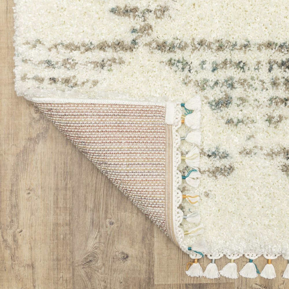 8' X 11' Ivory And Green Geometric Shag Area Rug With Fringe