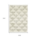 8' X 11' Ivory And Green Geometric Shag Area Rug With Fringe