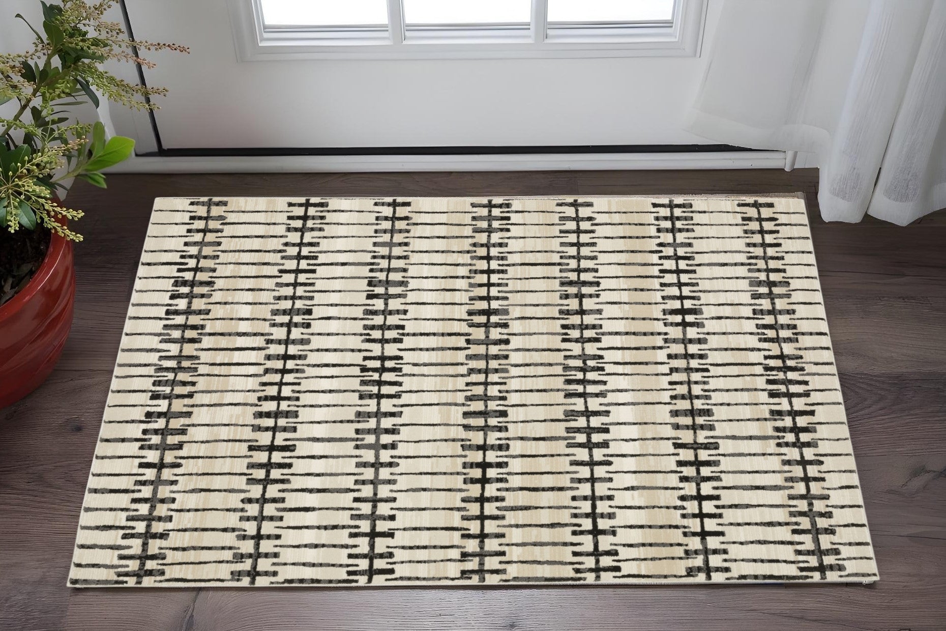 3' X 5' Beige And Black Geometric Area Rug