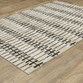 3' X 5' Beige And Black Geometric Area Rug