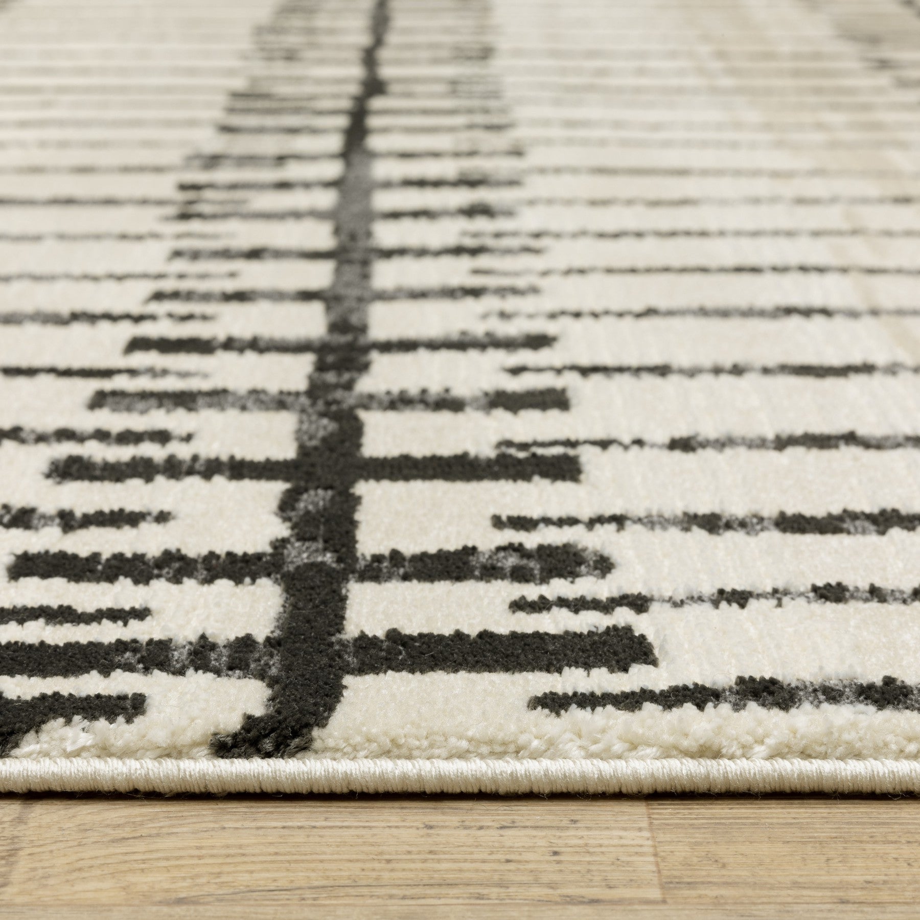 3' X 5' Beige And Black Geometric Area Rug