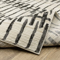 3' X 5' Beige And Black Geometric Area Rug