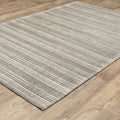 5' X 8' Ivory And Gray Striped Hand Tufted Area Rug