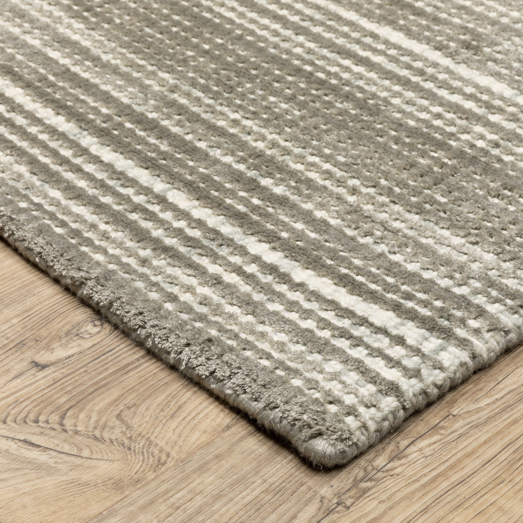 5' X 8' Ivory And Gray Striped Hand Tufted Area Rug