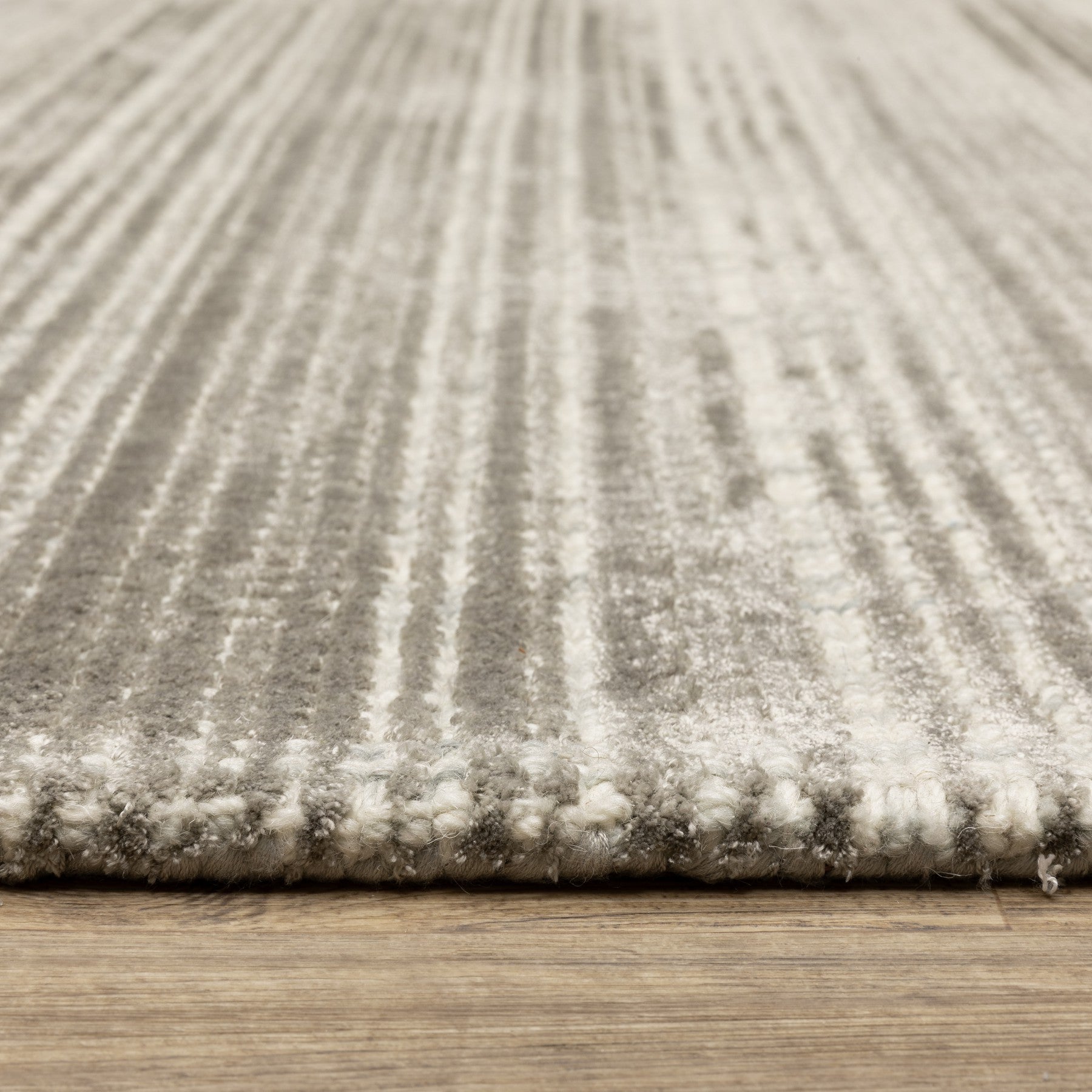 5' X 8' Ivory And Gray Striped Hand Tufted Area Rug