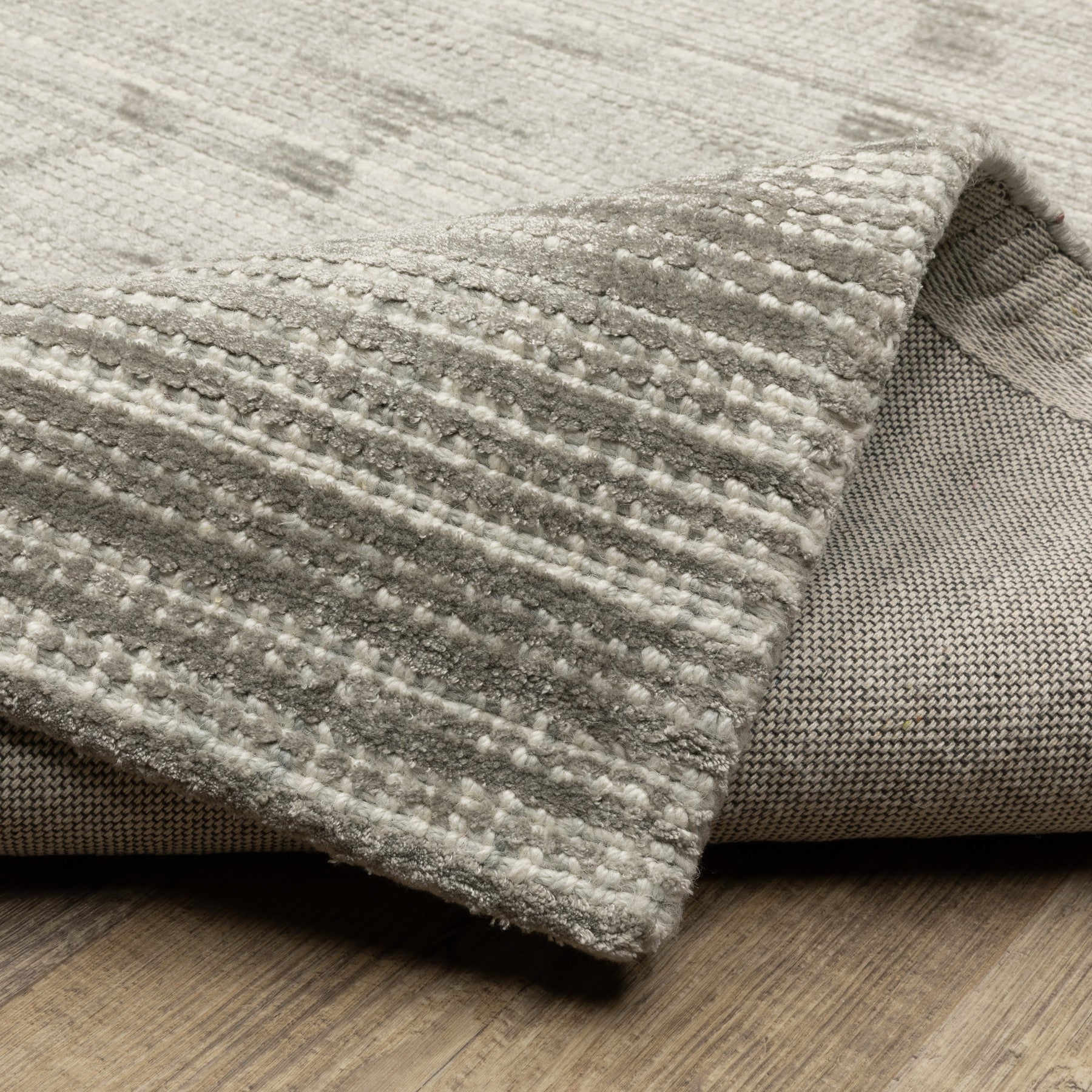 5' X 8' Ivory And Gray Striped Hand Tufted Area Rug