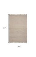 5' X 8' Beige Wool Hand Woven Area Rug With Fringe