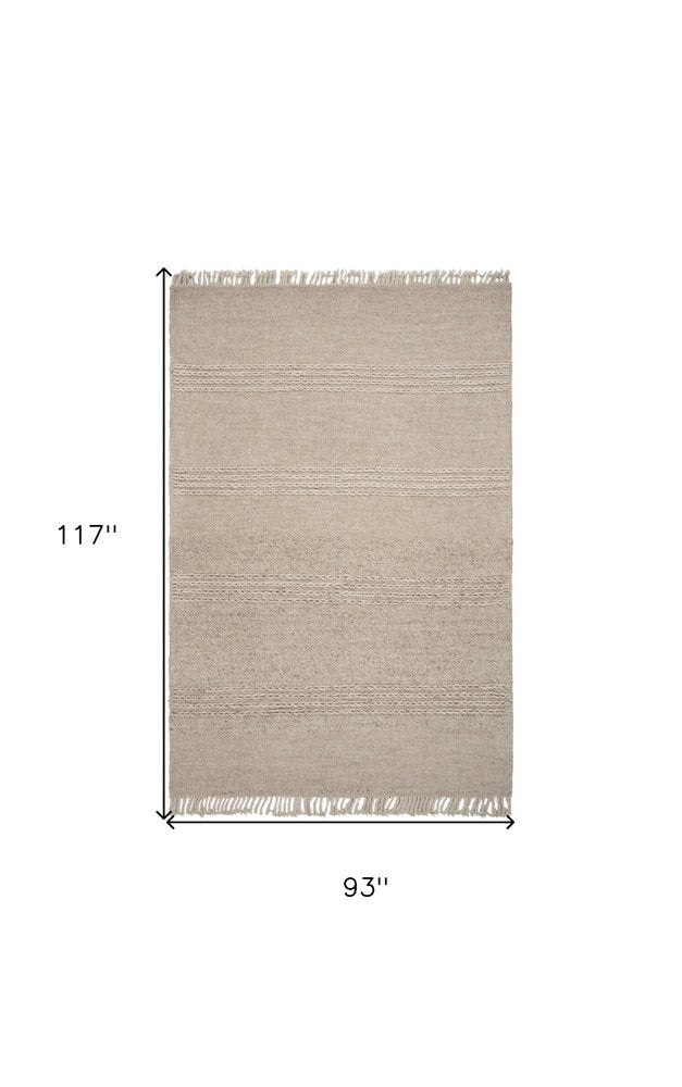 5' X 8' Beige Wool Hand Woven Area Rug With Fringe