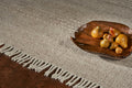 5' X 8' Beige Wool Hand Woven Area Rug With Fringe