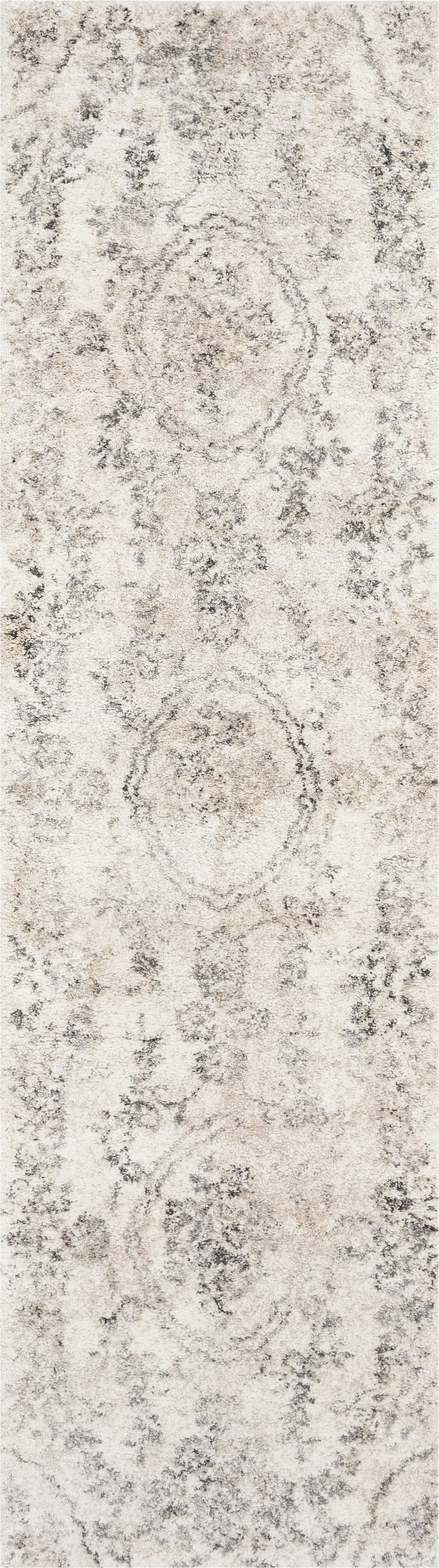 5' X 8' Gray And Tan Floral Distressed Area Rug