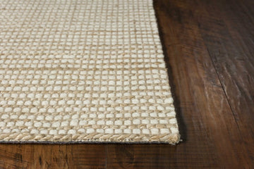 7' X 10' Tan and Ivory Wool Hand Woven Area Rug